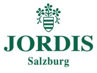 logo of jordis salzburg with a crest and flowers on it