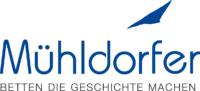 mühldorfer logo with black and blue lettering