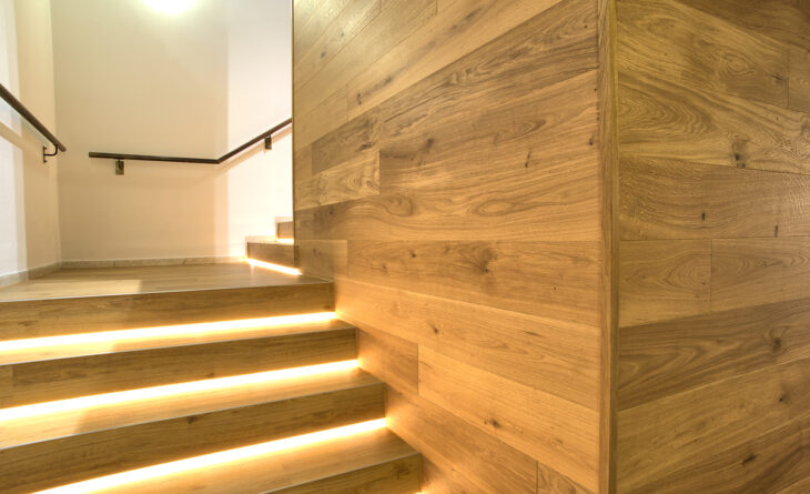 wall made of wood with stairs which are lighted