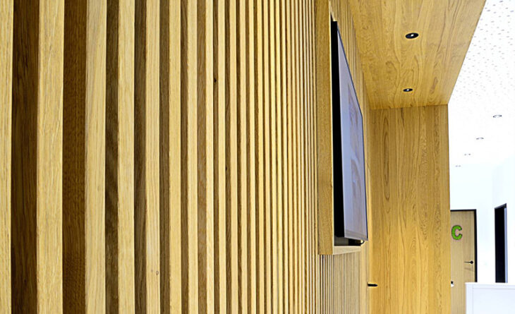 a tv on a wooden wall